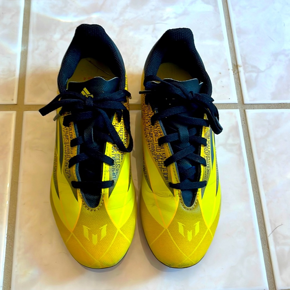Boy adidas soccer cleats - much brighter yellow than pictured
